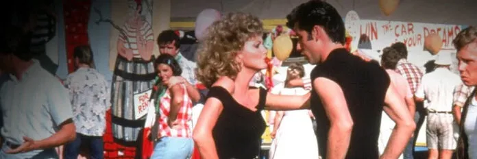 Por que John Travolta e Olivia Newton-John em cena do filme Grease, 1978, na sequência final da música